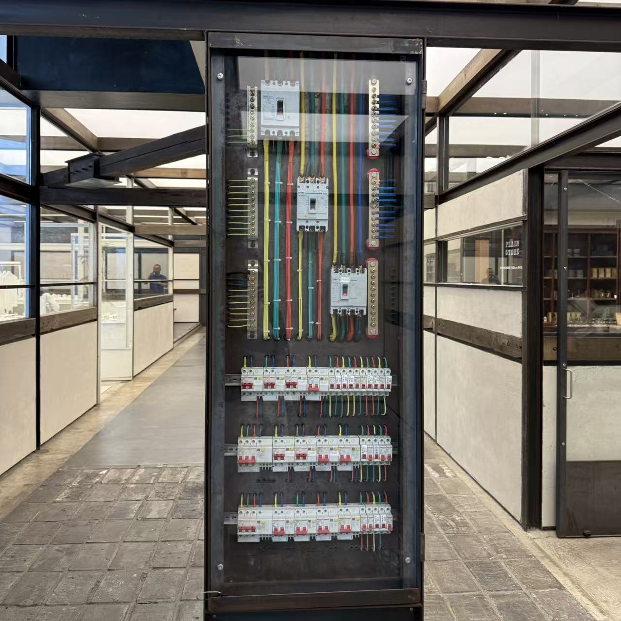 A colorful electrical panel displayed inside a Chengdu shop