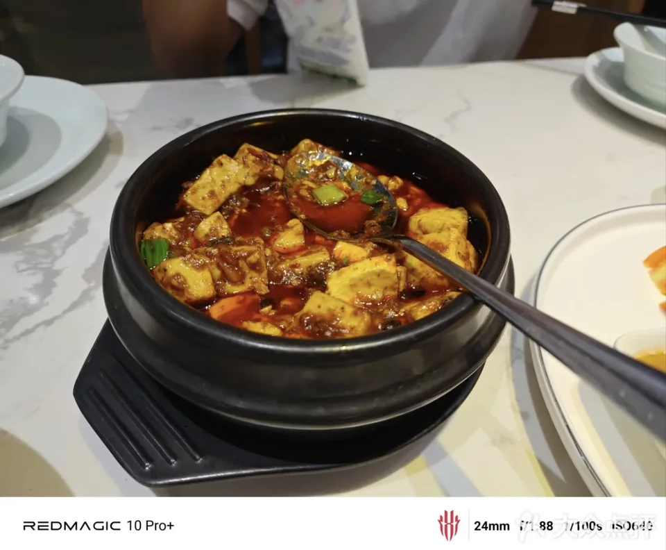 Mapo Tofu served in a black clay pot