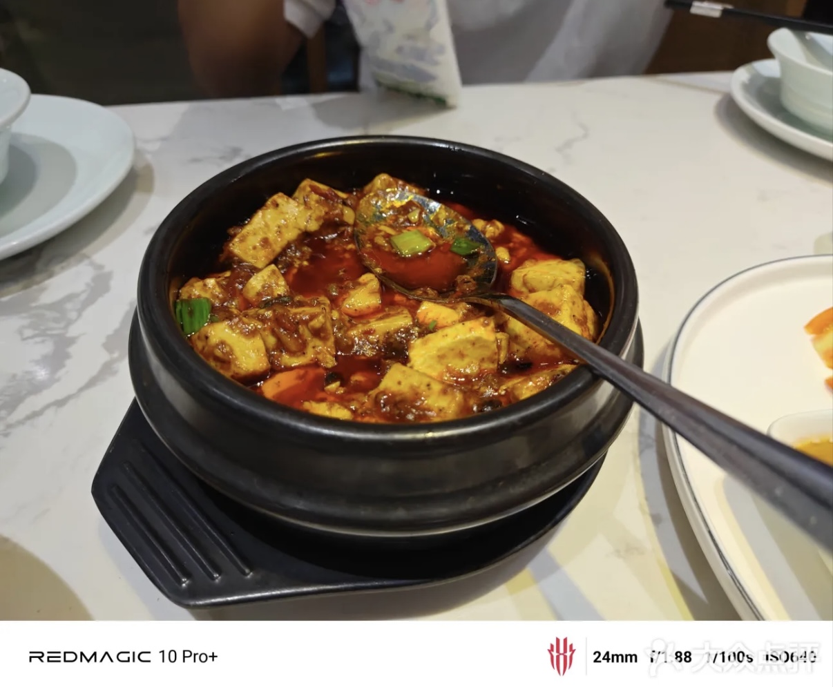 Mapo Tofu served in a black clay pot