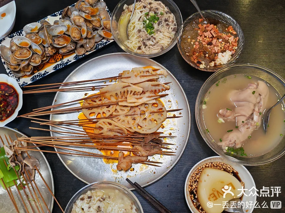 A spread of skewers, soup and side dishes at Tan Jia Boboji; original Dianping credit retained
